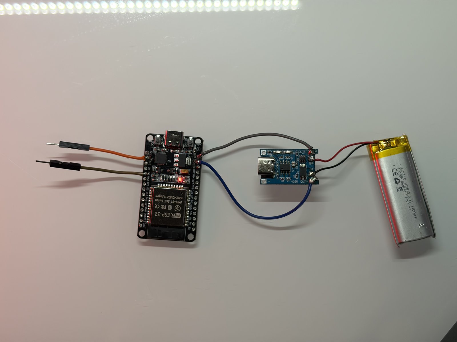 Player button electronics: ESP32, TP4056 charger and LiPo cell