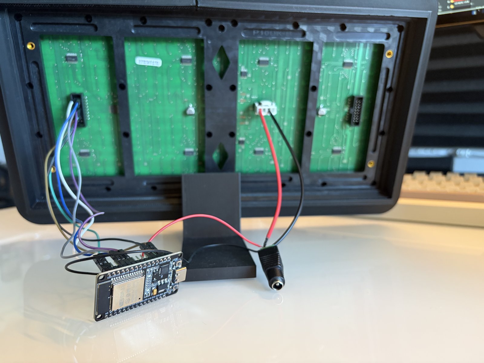ESP32 wired to the back of the P10 panel in its printed frame